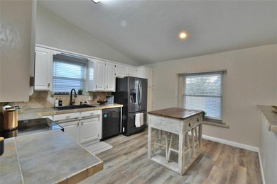 Beautifully updated home in the highly sought after Pecan on Pecan Plantation Country Club in Texas - for sale on GolfHomes.com, golf home, golf lot