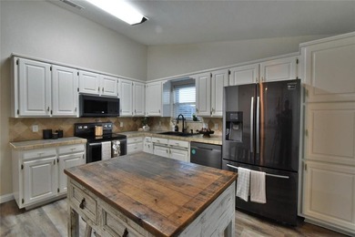 Beautifully updated home in the highly sought after Pecan on Pecan Plantation Country Club in Texas - for sale on GolfHomes.com, golf home, golf lot