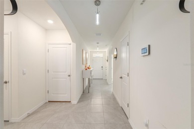 A fresh sense of calm rises from this single story residence on Lake Diamond Golf and Country Club in Florida - for sale on GolfHomes.com, golf home, golf lot