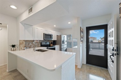 Million dollar golf course and water view for the fraction of on Isla Del Sol Yacht and Country Club in Florida - for sale on GolfHomes.com, golf home, golf lot