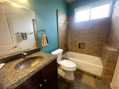 Discover this stunning high-end custom built  Santa Fe style on The Links At Coyote Wash in Arizona - for sale on GolfHomes.com, golf home, golf lot
