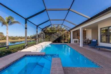 Situated on a premium water lot in the coveted golf community of on Sarasota National Golf Club in Florida - for sale on GolfHomes.com, golf home, golf lot