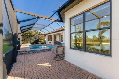 Situated on a premium water lot in the coveted golf community of on Sarasota National Golf Club in Florida - for sale on GolfHomes.com, golf home, golf lot