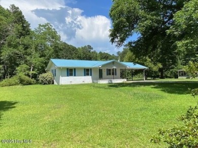 Adjacent to the Meadowlands Golf Course and nestled amongst the on Meadowlands Golf Club in North Carolina - for sale on GolfHomes.com, golf home, golf lot