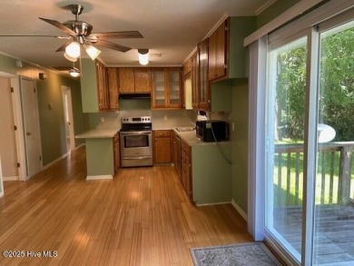 Adjacent to the Meadowlands Golf Course and nestled amongst the on Meadowlands Golf Club in North Carolina - for sale on GolfHomes.com, golf home, golf lot