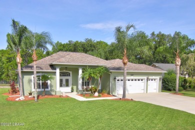 Located on a quiet dead-end street in the guard-gated Spruce on Spruce Creek Golf Club in Florida - for sale on GolfHomes.com, golf home, golf lot