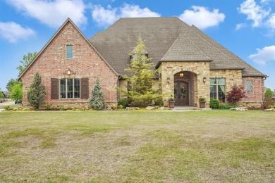 Stunning single story Epic Custom Homes masterpiece nestled in on The Patriot in Oklahoma - for sale on GolfHomes.com, golf home, golf lot