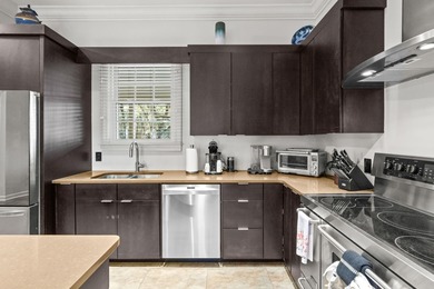 Tucked away on a quiet, tree-lined street within Wachesaw on Wachesaw Plantation Club in South Carolina - for sale on GolfHomes.com, golf home, golf lot