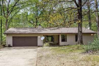 Welcome to 106 Tam O'Shanter Court -- a charming 2-bedroom on Diamondhead Golf and Country Club in Arkansas - for sale on GolfHomes.com, golf home, golf lot