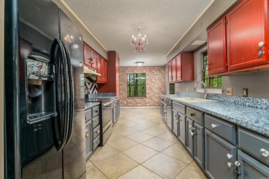 Welcome to 106 Tam O'Shanter Court -- a charming 2-bedroom on Diamondhead Golf and Country Club in Arkansas - for sale on GolfHomes.com, golf home, golf lot