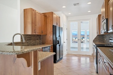 This great home has a sunny view overlooking the adjacent golf on Southgate Golf Course in Utah - for sale on GolfHomes.com, golf home, golf lot