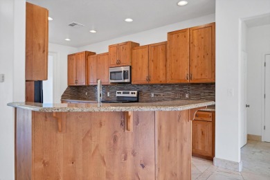 This great home has a sunny view overlooking the adjacent golf on Southgate Golf Course in Utah - for sale on GolfHomes.com, golf home, golf lot