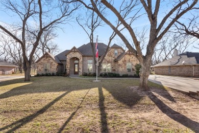 PEACEFUL ESCAPE in Pecan Plantation golfing community. One-owner for sale on GolfHomes.com