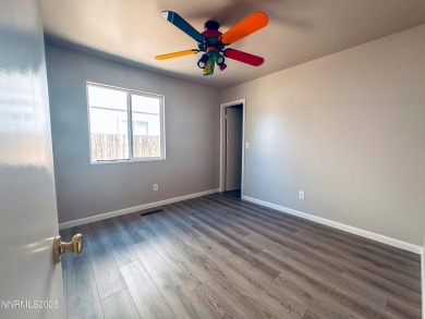 This 3 bedroom 2 bath home in the North Valleys has a spacious on Sierra Sage Golf Course in Nevada - for sale on GolfHomes.com, golf home, golf lot