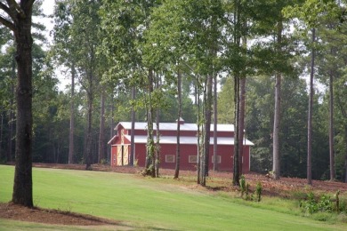 Build your dream lake home on this beautiful  +/- acre cleared on The Patriot Golf Club At Grand Harbor in South Carolina - for sale on GolfHomes.com, golf home, golf lot