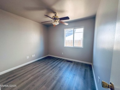 This 3 bedroom 2 bath home in the North Valleys has a spacious on Sierra Sage Golf Course in Nevada - for sale on GolfHomes.com, golf home, golf lot