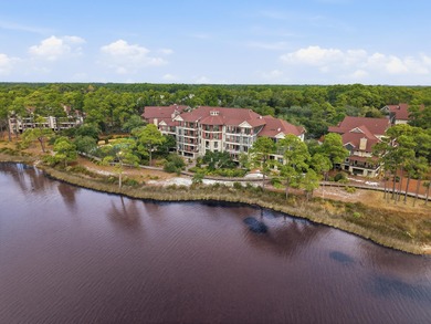 Morning light drifts across Lake Powell, reflecting softly on Sharks Tooth Golf Club in Florida - for sale on GolfHomes.com, golf home, golf lot