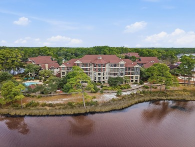Morning light drifts across Lake Powell, reflecting softly on Sharks Tooth Golf Club in Florida - for sale on GolfHomes.com, golf home, golf lot