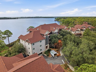 Morning light drifts across Lake Powell, reflecting softly on Sharks Tooth Golf Club in Florida - for sale on GolfHomes.com, golf home, golf lot