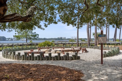 Morning light drifts across Lake Powell, reflecting softly on Sharks Tooth Golf Club in Florida - for sale on GolfHomes.com, golf home, golf lot