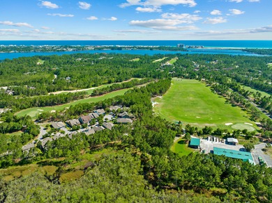 Morning light drifts across Lake Powell, reflecting softly on Sharks Tooth Golf Club in Florida - for sale on GolfHomes.com, golf home, golf lot