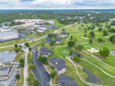 Enjoy the best of Branson living in this top-floor penthouse on Holiday Hills Resort and Golf in Missouri - for sale on GolfHomes.com, golf home, golf lot