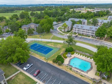 Enjoy the best of Branson living in this top-floor penthouse on Holiday Hills Resort and Golf in Missouri - for sale on GolfHomes.com, golf home, golf lot