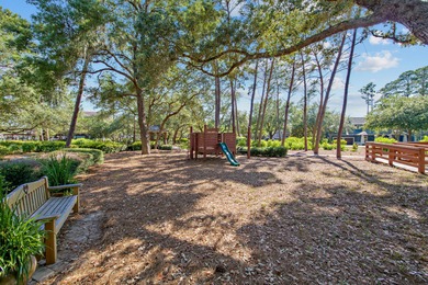 Morning light drifts across Lake Powell, reflecting softly on Sharks Tooth Golf Club in Florida - for sale on GolfHomes.com, golf home, golf lot
