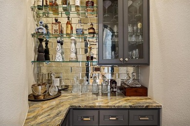 Welcome Home to this STUNNING, Waterfront, Updated Custom home on Timarron Country Club in Texas - for sale on GolfHomes.com, golf home, golf lot