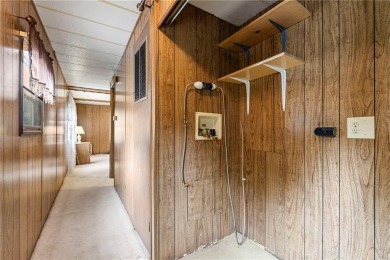 Nice weekend home on 3 LOTS (649, 650, and 651) on popular Buck on Linn Valley Lakes - Deer Trace Golf Course in Kansas - for sale on GolfHomes.com, golf home, golf lot