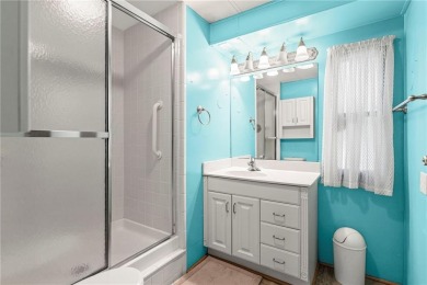 Nice weekend home on 3 LOTS (649, 650, and 651) on popular Buck on Linn Valley Lakes - Deer Trace Golf Course in Kansas - for sale on GolfHomes.com, golf home, golf lot