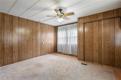 Nice weekend home on 3 LOTS (649, 650, and 651) on popular Buck on Linn Valley Lakes - Deer Trace Golf Course in Kansas - for sale on GolfHomes.com, golf home, golf lot