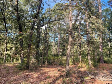 Build your dream home on this beautiful, heavily wooded 0 on Holly Lake Ranch Golf Club in Texas - for sale on GolfHomes.com, golf home, golf lot