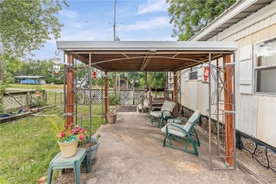 Nice weekend home on 3 LOTS (649, 650, and 651) on popular Buck on Linn Valley Lakes - Deer Trace Golf Course in Kansas - for sale on GolfHomes.com, golf home, golf lot