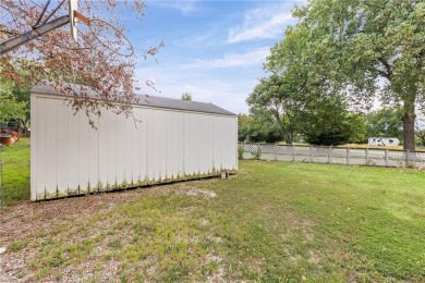 Nice weekend home on 3 LOTS (649, 650, and 651) on popular Buck on Linn Valley Lakes - Deer Trace Golf Course in Kansas - for sale on GolfHomes.com, golf home, golf lot