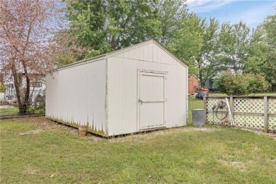 Nice weekend home on 3 LOTS (649, 650, and 651) on popular Buck on Linn Valley Lakes - Deer Trace Golf Course in Kansas - for sale on GolfHomes.com, golf home, golf lot