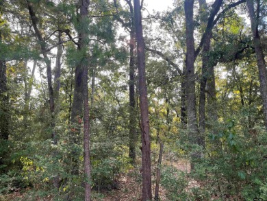 Build your dream home on this beautiful, heavily wooded 0 on Holly Lake Ranch Golf Club in Texas - for sale on GolfHomes.com, golf home, golf lot