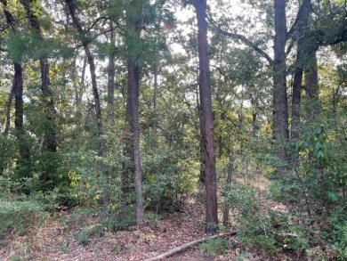 Build your dream home on this beautiful, heavily wooded 0 on Holly Lake Ranch Golf Club in Texas - for sale on GolfHomes.com, golf home, golf lot