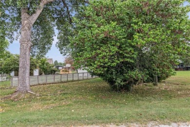 Nice weekend home on 3 LOTS (649, 650, and 651) on popular Buck on Linn Valley Lakes - Deer Trace Golf Course in Kansas - for sale on GolfHomes.com, golf home, golf lot