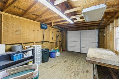 Nice weekend home on 3 LOTS (649, 650, and 651) on popular Buck on Linn Valley Lakes - Deer Trace Golf Course in Kansas - for sale on GolfHomes.com, golf home, golf lot