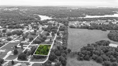 Nice weekend home on 3 LOTS (649, 650, and 651) on popular Buck on Linn Valley Lakes - Deer Trace Golf Course in Kansas - for sale on GolfHomes.com, golf home, golf lot