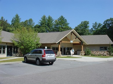 Nestled in the scenic beauty of Sapphire Valley, this delightful on Sapphire National Golf Club in North Carolina - for sale on GolfHomes.com, golf home, golf lot