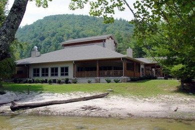 Nestled in the scenic beauty of Sapphire Valley, this delightful on Sapphire National Golf Club in North Carolina - for sale on GolfHomes.com, golf home, golf lot