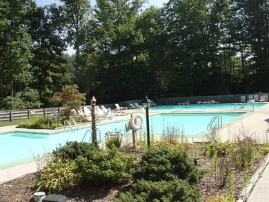 Nestled in the scenic beauty of Sapphire Valley, this delightful on Sapphire National Golf Club in North Carolina - for sale on GolfHomes.com, golf home, golf lot