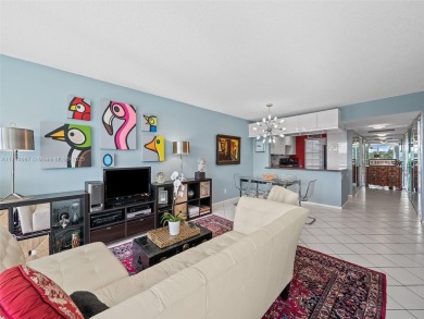 Step into South Florida living with this corner-unit stunning on Oaks Country Club in Florida - for sale on GolfHomes.com, golf home, golf lot