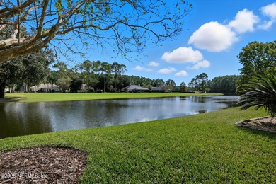 Nestled within the gated golf community of Cimarrone Golf & on Cimarrone Golf and Country Club in Florida - for sale on GolfHomes.com, golf home, golf lot