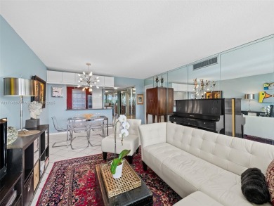 Step into South Florida living with this corner-unit stunning on Oaks Country Club in Florida - for sale on GolfHomes.com, golf home, golf lot
