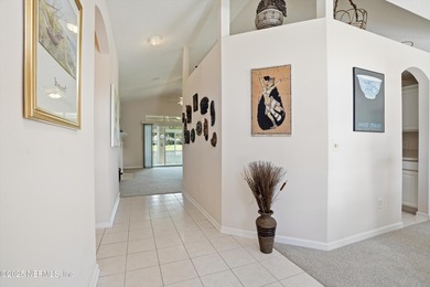 Nestled within the gated golf community of Cimarrone Golf & on Cimarrone Golf and Country Club in Florida - for sale on GolfHomes.com, golf home, golf lot