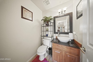 Welcome to this beautifully maintained 3-bedroom, 2.5-bath home on Palm Valley Golf Club  in Arizona - for sale on GolfHomes.com, golf home, golf lot