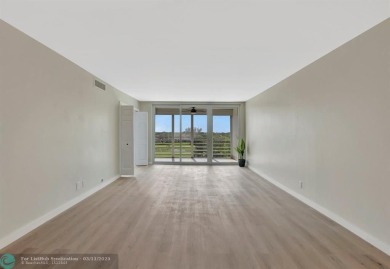 Completely and magnificently updated PENTHOUSE unit with on Palm-Aire Country Club and Resort - Palms in Florida - for sale on GolfHomes.com, golf home, golf lot